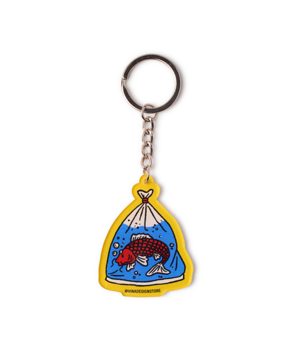 A FISH TRAVELING AROUND THE CITY Keychain